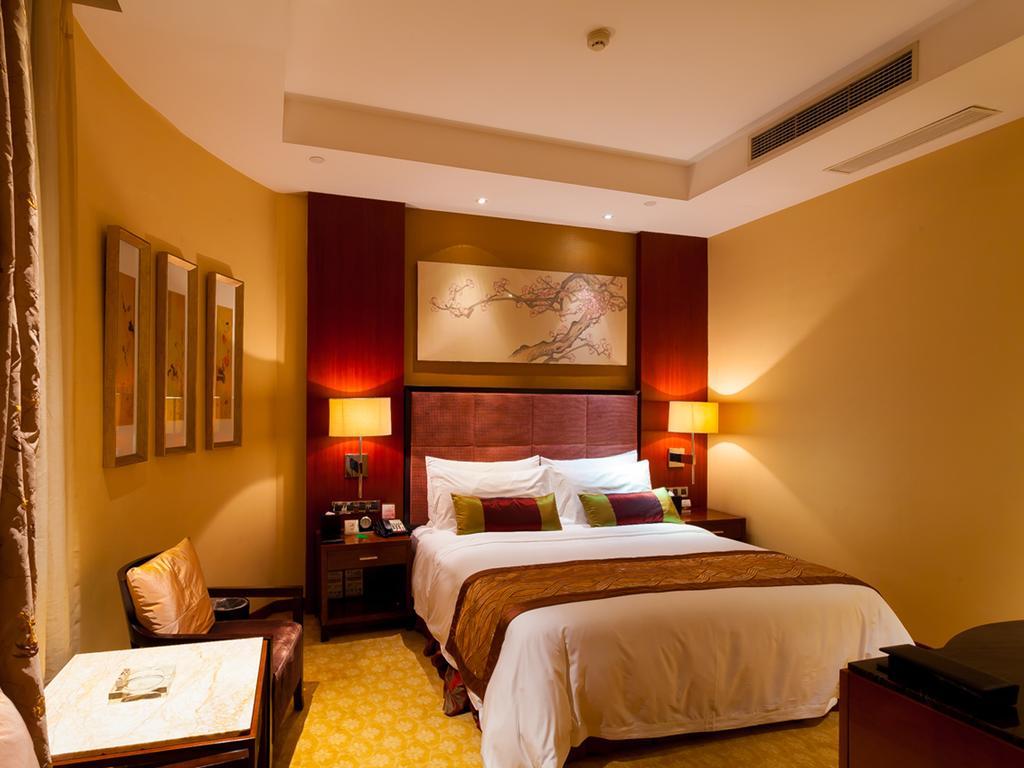 Celebrity City Hotel Chengdu Quarto foto