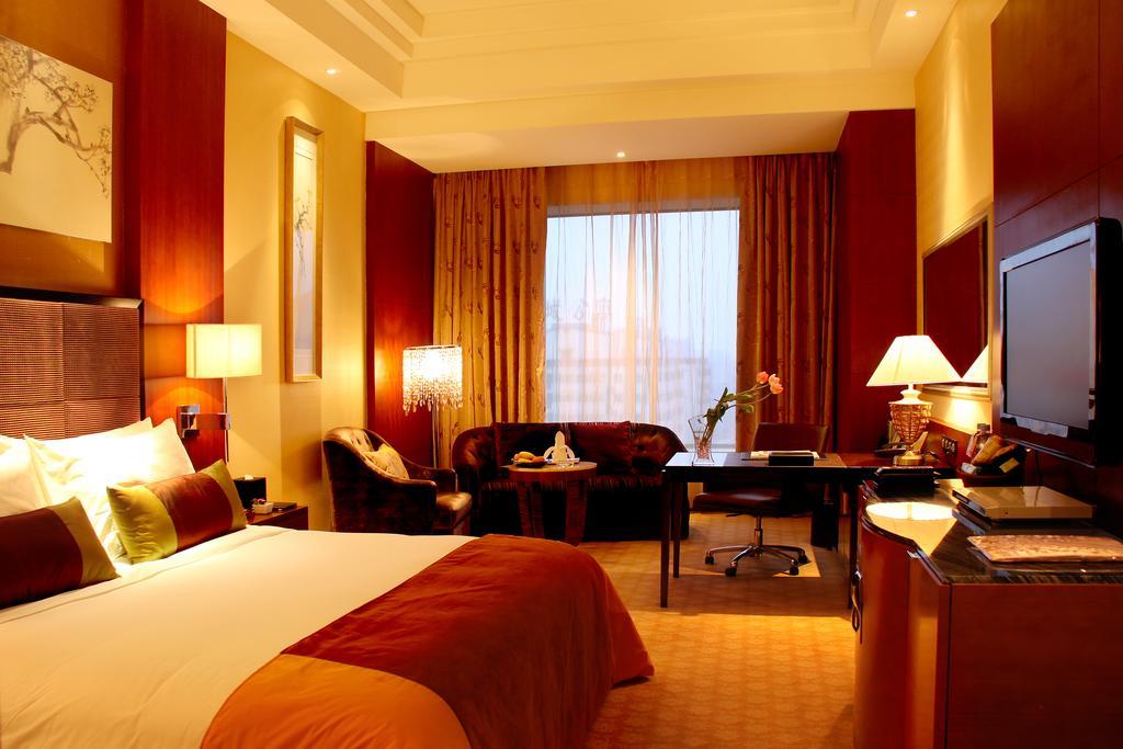 Celebrity City Hotel Chengdu Quarto foto